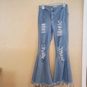 Rue21 Faded, distressed, high-waisted bell bottom jeans. Size 5